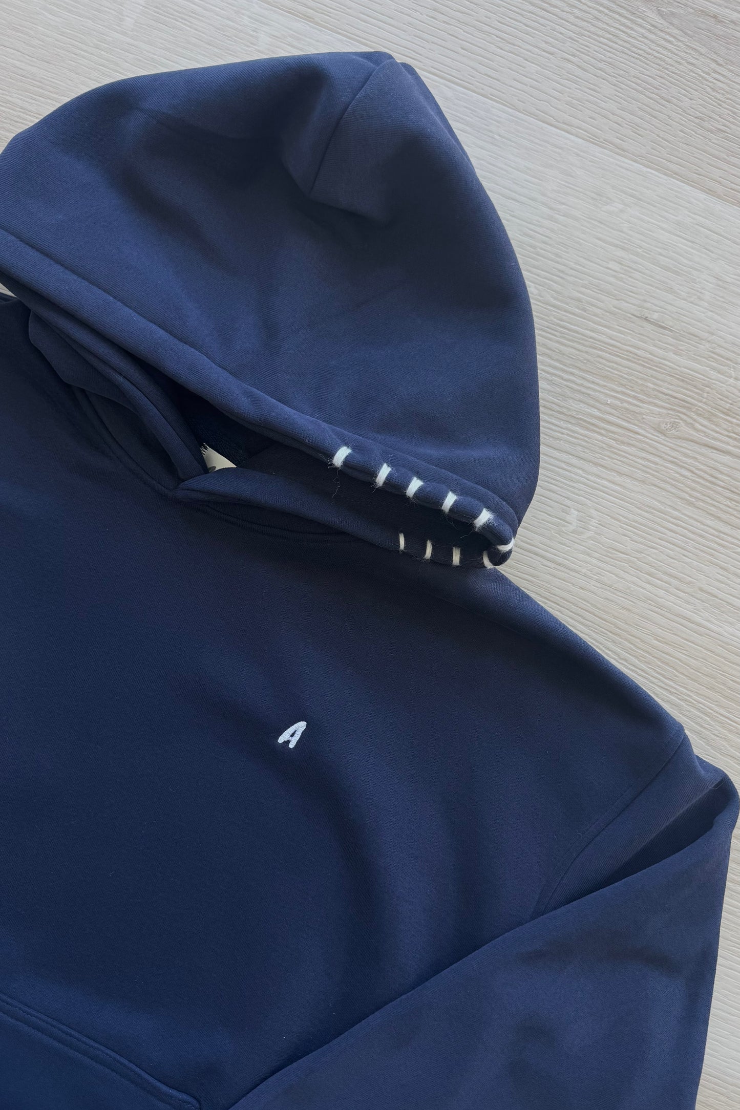 "Stitchwork" Hoodie in Ocean Navy